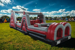 7c52324c 584f 465a ba68 f0d6a24dbd6720 20Edited 1769811911 Red & Black Climbing 50ft Obstacle Course